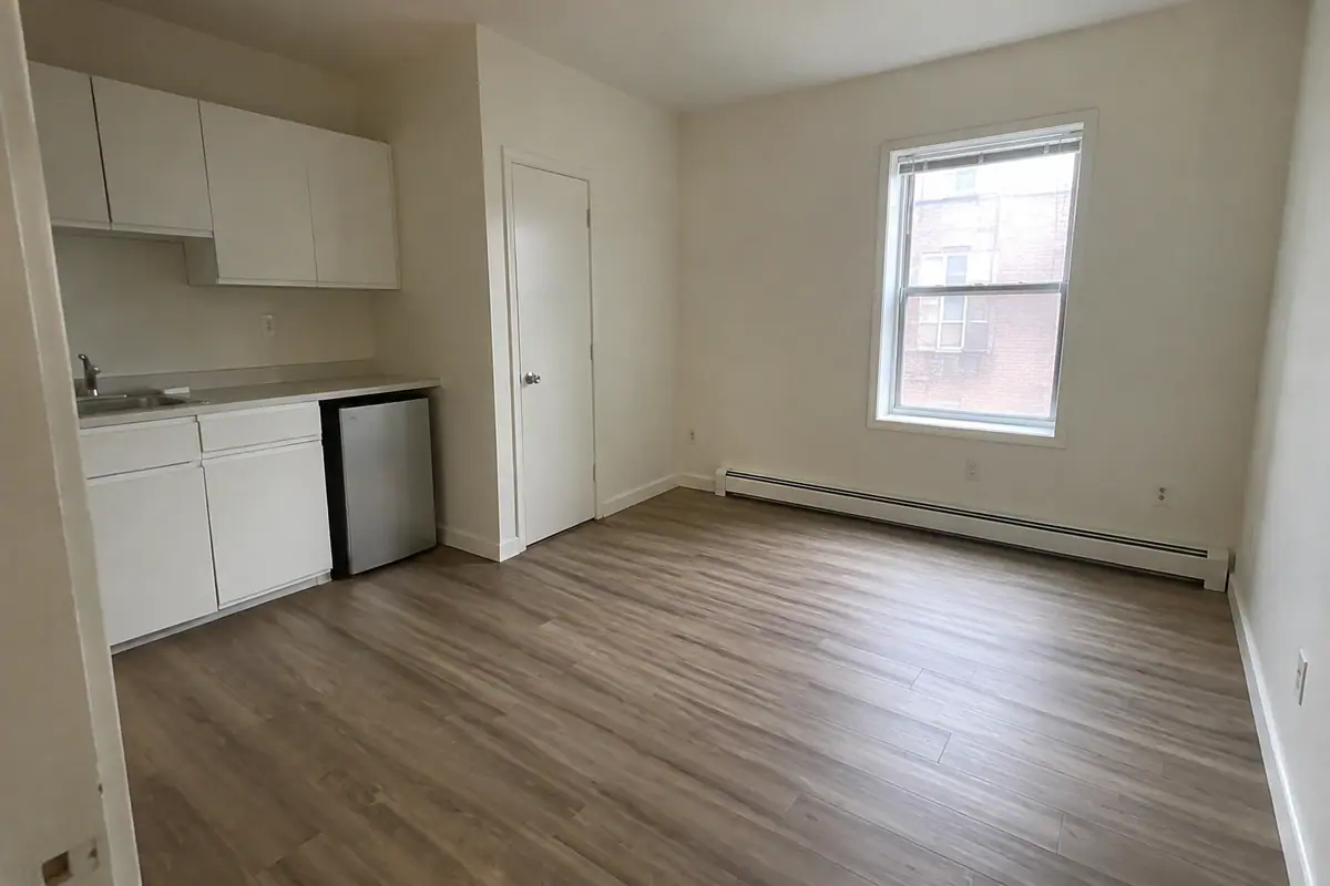 Studio apartment — before (phone photo)